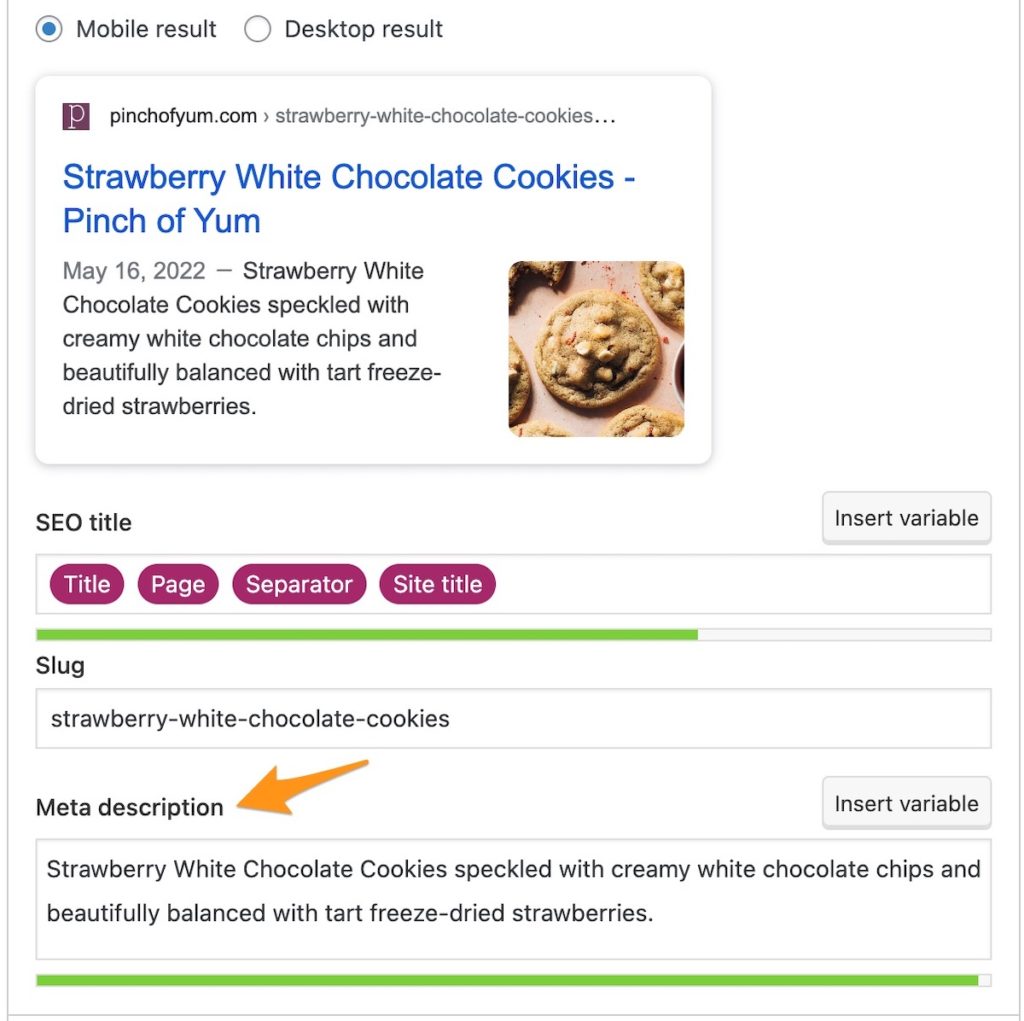 an orange arrow pointing to the meta description in the Yoast SEO WordPress plugin for Pinch of Yum's Strawberry White Chocolate Cookies