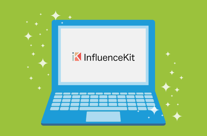 Graphic of blue laptop in front of a green background with the InfluenceKit logo on the screen